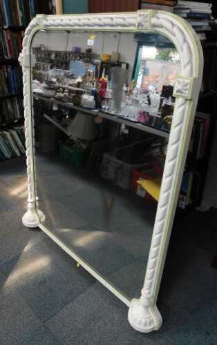 An overmantel mirror, in a later painted frame, decorated with starburst rosettes within a...