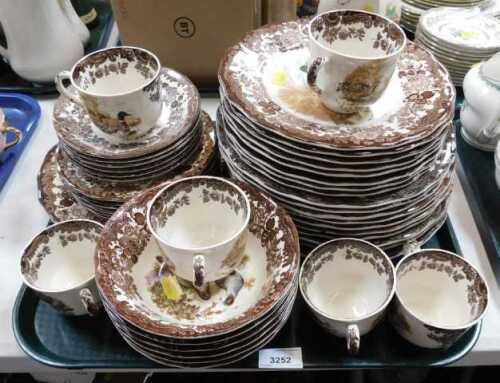 A part Palissy dinner service, teacups, saucers, side plates, dinner plates, etc. (1 tray)