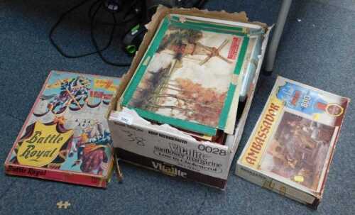 Jigsaw puzzles, a box containing a quantity of jigsaw puzzles, vintage.