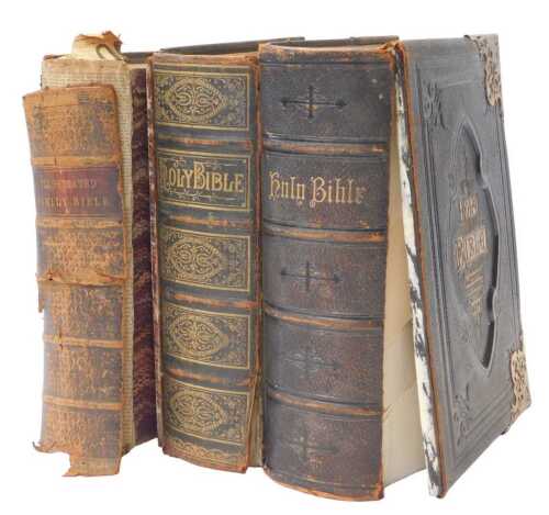 Two Victorian leather and brass bound Holy Bibles, comprising a Brown's self-interpreting family...
