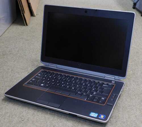 A DELL Latitude Core 15 laptop, lacking a hard drive.