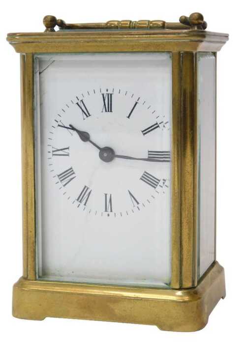 An early 20thC French brass-cased carriage clock, with a white enamel dial having Roman numerals,...