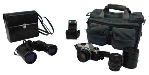 A Pentax ME Super camera, together with a Pentax flash, Ozeck lens, contained in a camera bag,...