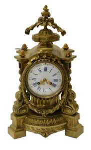 A late 19thC French Napoleon III style ormolu mantel clock, with an eight day movement striking...