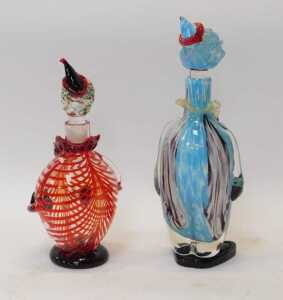 Two glass clown decanters, one in predominantly blue mottled and black glass, 40cm high, the... - 2