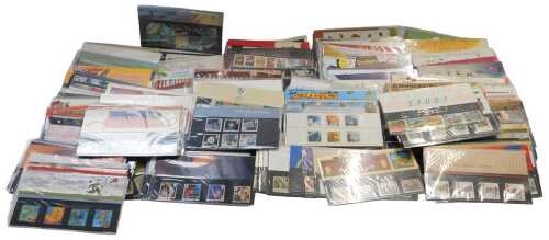 A collection of Royal Mint stamp presentation sleeves, 1980s and later. (1 box)