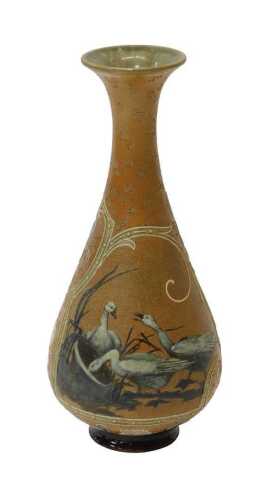 A Royal Doulton stoneware bottle vase by Florence Barlow, decorated with a reserve of three...