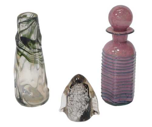 Three items of decorative glassware, comprising a penguin paperweight, 12cm high, a Mdina...