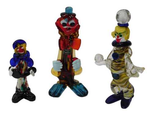 Three Murano glass clown figures, one with a label for the Venetian Glass Company, the tallest...