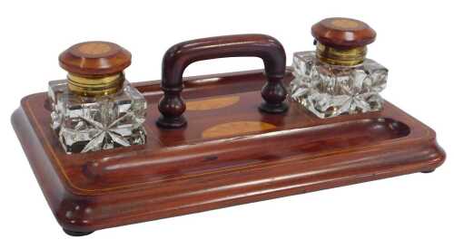 A 20thC mahogany and inlaid Sheraton Revival desk stand, of rectangular form, with two pen...