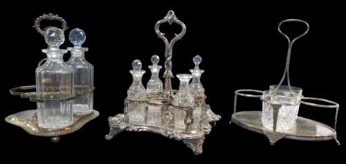 Three Victorian and later silver plated cruet stands, each containing some cut glass bottles,...