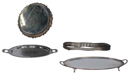 An early 20thC silver plated wedding cake stand, with a central mirrored section, in a floral...