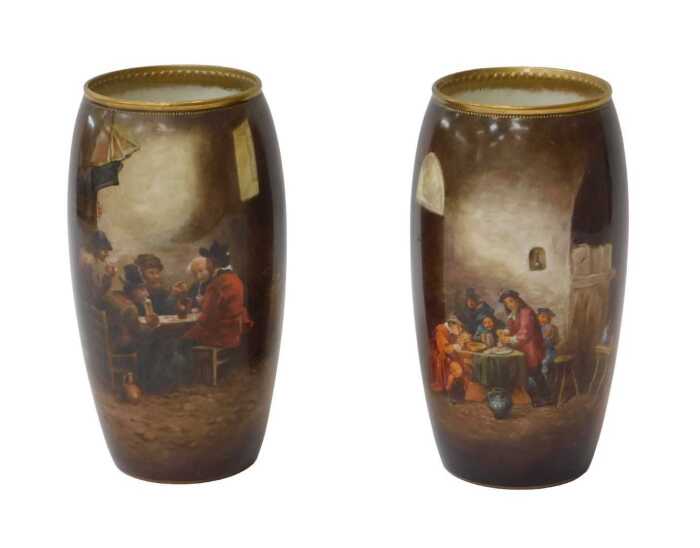 A pair of Royal Doulton ovoid vases, painted with Dutch interior tavern scenes with figures...