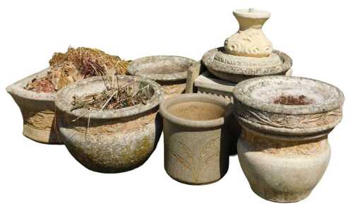 A group of composition stone garden plant pots, to include a planter of bellied form, with a...
