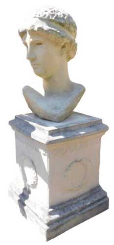 A composition stone bust, of a classical gentleman, raised on a square plinth decorated with...