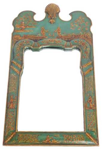 An early 20thC Japanned lacquer wall mirror, the break arch top with central scallop shell...