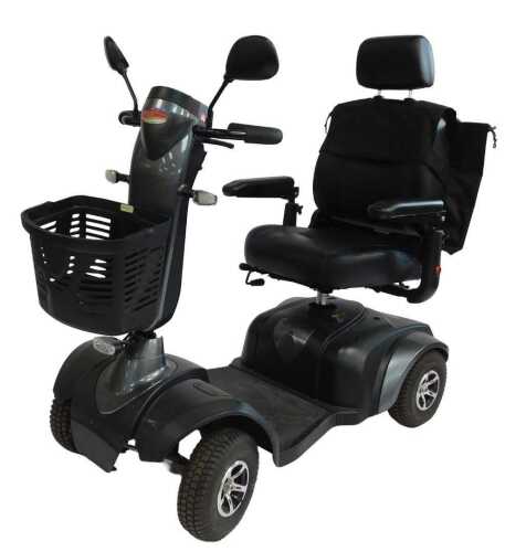 A mobility scooter, with a grey chassis, with charger and key.