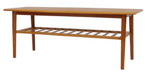 A mid-century teak coffee table, of elliptical form, on turned legs, united by a slatted...