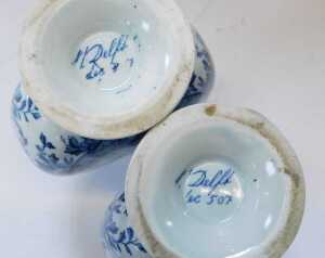 A pair of Delft blue and white transfer printed ewers, decorated with scenes of shipping and... - 2