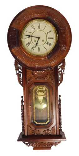 A Victorian style mahogany cased regulator wall clock, the circular dial bearing Roman numerals,...