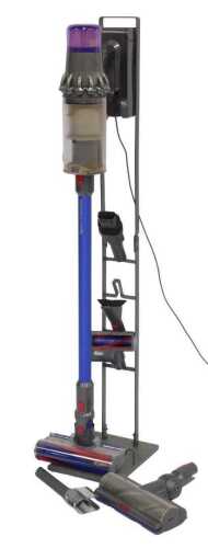 A Dyson V11 Absolute vacuum cleaner, with attachments and stand.