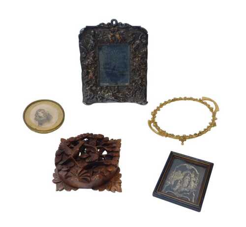 A late 19thC silver plated framed table mirror, with figures of cherubs in relief, easel back,...