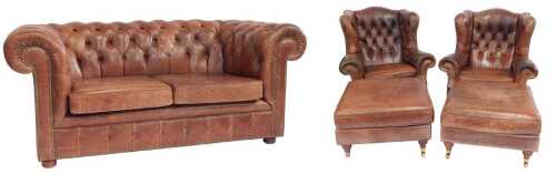A brown leather five piece suite, comprising a two seater Chesterfield sofa, 175cm wide, a pair...