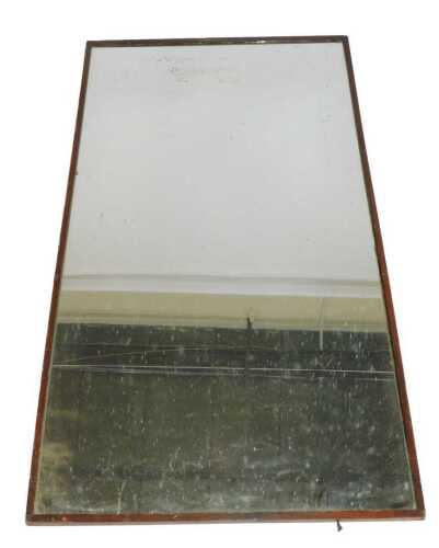 A mahogany framed rectangular wall mirror, 225cm x 122cm.