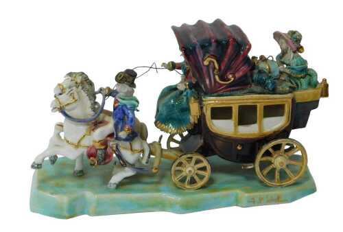 A 20thC art pottery polychrome group, of carriage and figures, bearing indistinct signature,...