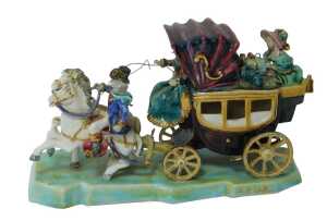 A 20thC art pottery polychrome group, of carriage and figures, bearing indistinct signature,...