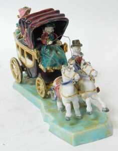 A 20thC art pottery polychrome group, of carriage and figures, bearing indistinct signature,... - 2