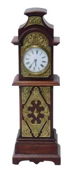 A late 19thC oak clock tower mantel timepiece, in a square-section slender oak case, with brass...
