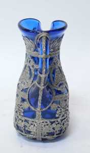 A Continental blue glass jug, with white metal lattice overlay, of flower heads, ropework and... - 2