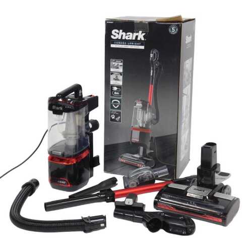 A Shark corded upright vacuum cleaner, boxed.