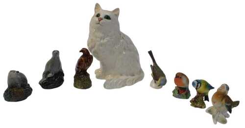 A Beswick pottery model of a Persian cat, 21cm high, together with a Beswick Blue Tit, Royal...