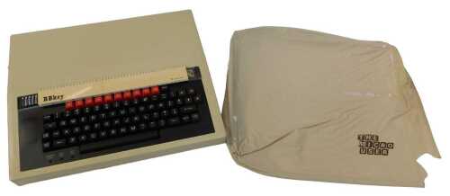 A BBC microcomputer, serial number 167333, in a polystyrene box with partial cover.