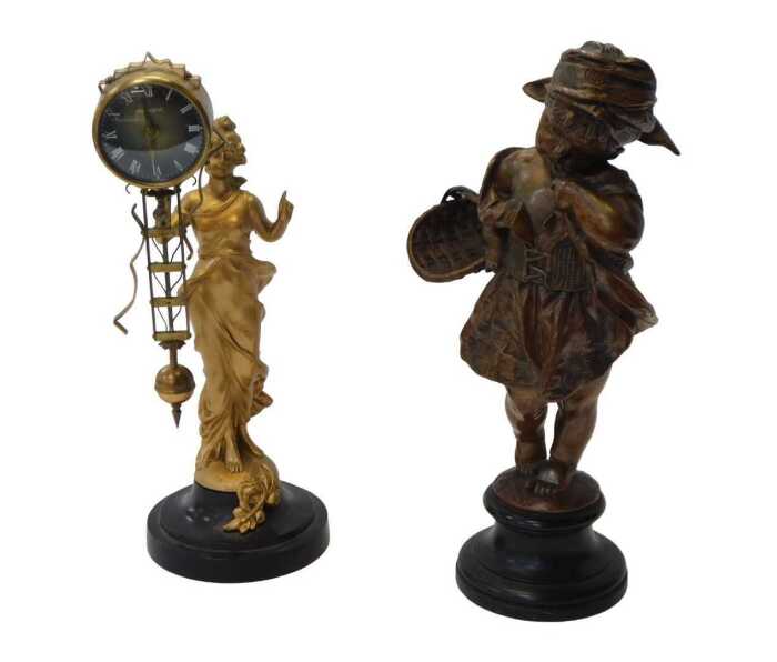 A gilt metal President swinging Diana mystery clock, in the form of a young woman in flowing...