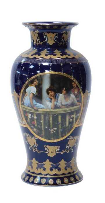 A Continental porcelain baluster vase, with two decorative reserves of transfer decoration of...