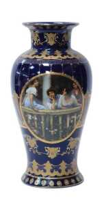 A Continental porcelain baluster vase, with two decorative reserves of transfer decoration of...
