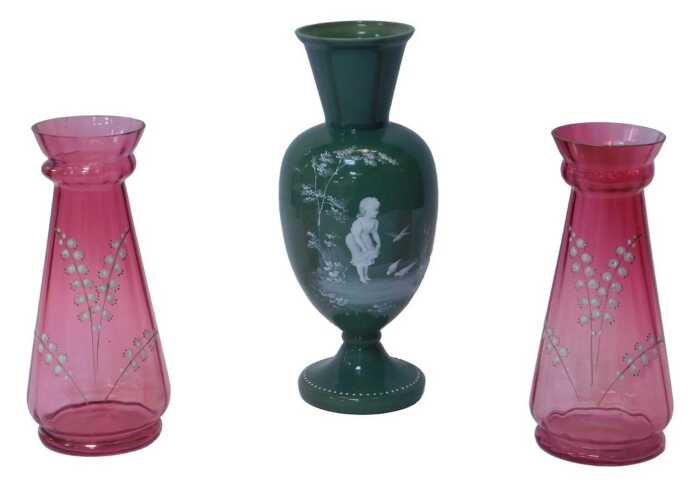 An opaque glass baluster vase, with painted Mary Gregory style decoration of a young girl...