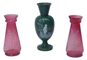 An opaque glass baluster vase, with painted Mary Gregory style decoration of a young girl...