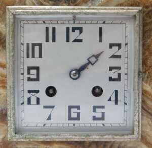 An Art Deco multi-tonal marble mantel clock, the square silvered face bearing Arabic numerals... - 2