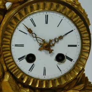 A late 19thC French Empire style gilt ormolu mantel clock, surmounted with a figure of a mother... - 2