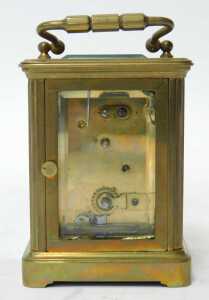 A 20thC brass cased carriage clock, the rectangular white enamel dial bearing Roman numerals,... - 2