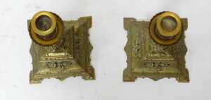 A pair of Victorian brass candlesticks, each with a circular drip tray, the square outswept base... - 2