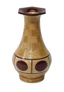 An IW Robinson elm purpleheart and maple baluster vase, with an elongated flared neck and...