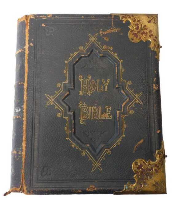 A Victorian leather and brass bound Holy Bible, with the commentaries of Scott and Henry,...