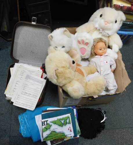 Soft toys, including Teddy bear, a doll, etc, together with sheet music contained in a brown...