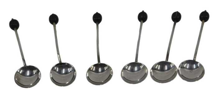 A cased set of six George V silver coffee bean spoons, each with coffee bean ends, plain stems...