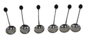 A cased set of six George V silver coffee bean spoons, each with coffee bean ends, plain stems...